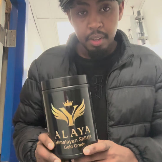 Man holding Alaya Shilajit Gold Grade jar, sharing testimonials about brain power, memory, and mental focus with subtitles.