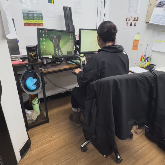 Professional woman in an office setting showing Alaya Shilajit as her secret for maintaining focus during long work shifts.